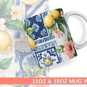 May include: White ceramic mug featuring a wrap-around design with lemons, flowers, and blue tile patterns. The design includes yellow lemons, pink hibiscus flowers, and a blue and white tile pattern. The mug is labeled "11OZ & 150Z MUG WRAP".
