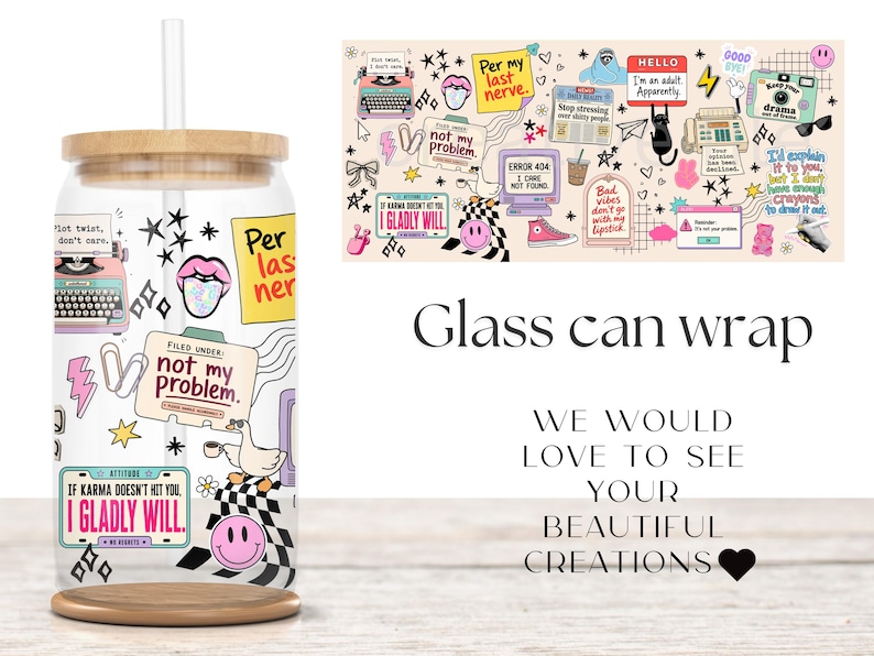 May include: A clear glass can-shaped tumbler with a bamboo lid and straw, featuring a colorful sticker-style collage print. Graphics include a typewriter, a goose, smiley faces, and text such as "not my problem" and "I GLADLY WILL."