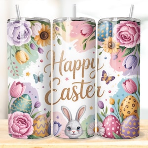 May include: A set of three stainless steel tumblers with lids and straws. Each tumbler features a watercolor design with the words "Happy Easter" in gold script, along with floral and Easter egg illustrations. The design includes a bunny, butterflies, and flowers.