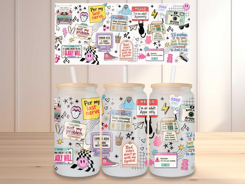 May include: Three frosted glass tumblers with bamboo lids and straws, featuring a colorful collage of retro-style graphics, including a typewriter, computer monitors, a camera, and various humorous text phrases like Per my last nerve and Error 404.