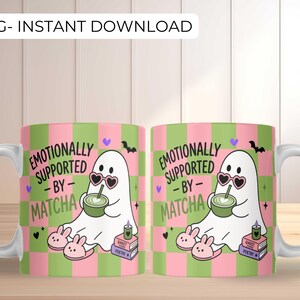 May include: Two white ceramic mugs featuring a pink and green checkered pattern. The design includes a white ghost wearing heart-shaped sunglasses, holding a green matcha drink, wearing bunny slippers, and sitting by books with text: EMOTIONALLY SUPPORTED BY MATCHA.