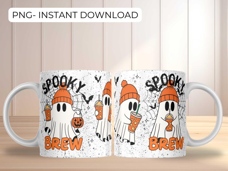 May include: White ceramic mug with a Halloween-themed design. The mug features a cartoon ghost wearing an orange beanie and holding a drink. The words "Spooky Brew" are printed in orange, along with bats and a spiderweb.