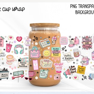 May include: A 16 oz cup wrap with a wooden lid, covered in colorful stickers with inspirational quotes and graphics. The stickers include hearts, stars, and phrases like "Love Yourself" and "Make it Happen."