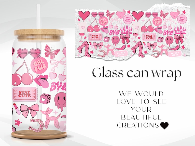 May include: A glass can wrap with a pink and white design. The wrap features various illustrations, including cherries, hearts, bows, and the text "GRL PWR" and "STAY CUTE". The can has a wooden base and a bamboo lid.