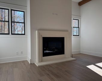 Cast limestone fireplace mantel surround