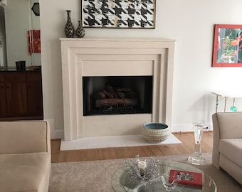 Cast limestone fireplace mantel