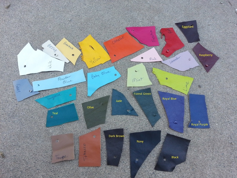 May include: Leather swatches in various colors, including teal, powder blue, baby blue, mint, forest green, jade, royal blue, olive, dark brown, navy, black, lime, eggplant, raspberry, beige, banana, orange, yellow, pink, and lavender.