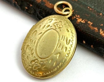 Vintage locket charm, vintage locket, vintage charm, vintage brass locket, oval locket, vintage jewelry, tiny locket