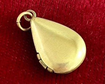 Vintage locket charm, vintage locket, vintage charm, vintage brass locket, drop locket, teardrop locket, vintage jewelry, tiny locket