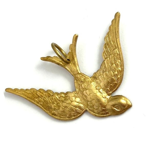 Vintage Brass Swallow Pendant: Flying Bird Symbolic Jewelry