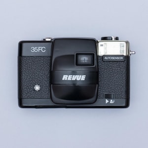 Revue 35 FC compacte 35 mm-filmcamera met richten en vastzetten