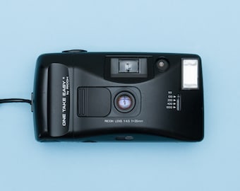Ricoh Timekeeper Cámara compacta de 35 mm para apuntar y disparar