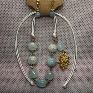 Matching Glass Bead Bracelet and Earring set on Chinese style adjustable Cord with a hand charm