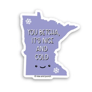 May include: A light purple sticker shaped like the state of Minnesota featuring two white snowflake icons and a small smiling face. The text reads, "YOU BETCHA, IT'S NICE AND COLD" in white letters with black outlines. The text "kiss and punch" is at the bottom.