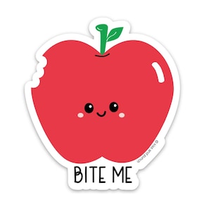 May include: A red apple sticker with a bite taken out of it. The apple has a smiling face with black eyes and a curved mouth. The text "BITE ME" is below the apple.
