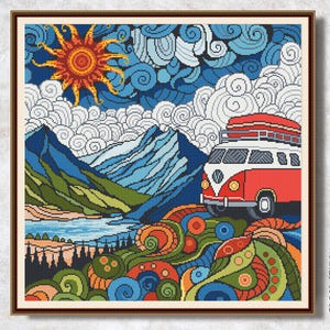 May include: A framed cross-stitch art piece depicting a red and white vintage van driving through a mountain landscape. The scene includes a vibrant sun, blue sky, mountains, and colorful swirling patterns. The words "CROSS STITCH DIGITAL PDF" are in the lower right corner.