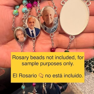 May include: A rosary with oval pendants featuring portraits, connected by silver chains and colorful beads. The image includes the text: "Rosary beads not included, for sample purposes only."