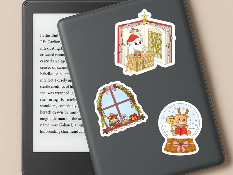 May include: A collection of Christmas-themed stickers. One sticker shows a ghost-like figure in a Santa hat in a library. Another shows a window with Christmas decorations. The last sticker shows a reindeer in a snow globe.