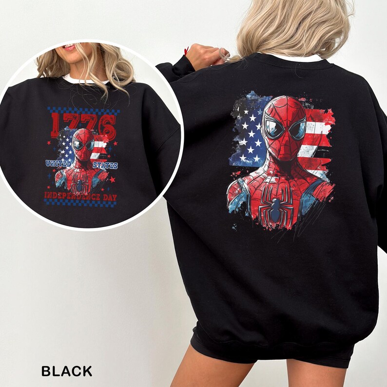 May include: A black sweatshirt featuring a graphic of Spider-Man against a stylised American flag. The back displays a large print, while the front includes a smaller version with the text 1776 UNITED STATES INDEPENDENCE DAY in red and blue.