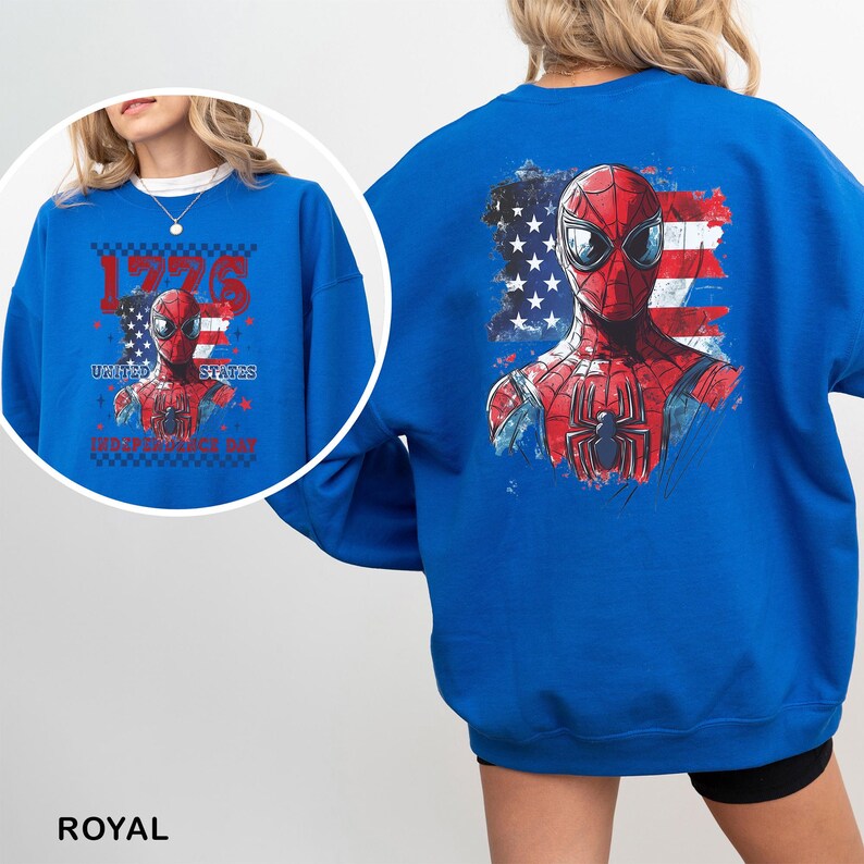 May include: A royal blue crewneck sweatshirt featuring a large graphic on the back of the superhero Spider-Man layered over a distressed American flag. A circular inset shows the same graphic with the text 1776 United States Independence Day.