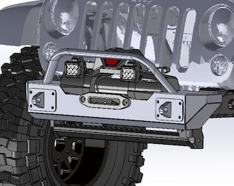 May include: A silver front bumper with two square LED lights mounted on the top. The bumper is attached to a gray Jeep Wrangler with large tires.