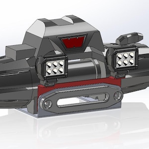 Puede incluir: Un parachoques de cabrestante negro con dos luces LED rectangulares y un logotipo "W" rojo. El parachoques tiene una placa de metal negro con un recorte para una cuerda de cabrestante.