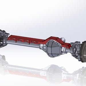 May include: A detailed 3D rendering of a vehicle axle assembly. The assembly features a central red component with a series of cutouts, flanked by gray mechanical parts, including disc brakes and hubs. The design is set against a white background.
