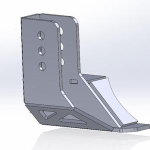May include: A metal bracket with a rectangular base and a vertical section with multiple holes. The bracket is designed for mounting or attaching objects.