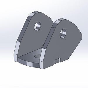Könnte beinhalten: Eine Metallhalterung mit zwei Löchern und einer abgerundeten Kante. Die Halterung ist aus silberfarbenem Metall.