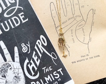 the palm reader necklace / brass hand pendant necklace with starburst charm / hand pendant / figural hand necklace / fortune teller necklace