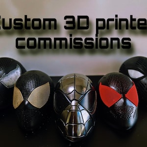 May include: Five custom 3D printed masks, each with a unique design. The masks are black, silver, and red, with various eye shapes and textures. Text at the top reads "Custom 3D printed commissions."