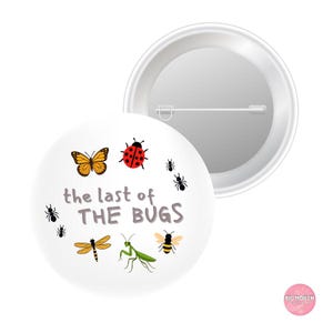 May include: A round white pinback button featuring a colorful illustration of various insects including a butterfly, ladybug, dragonfly, mantis, bee, and ants. The text "the last of THE BUGS" is printed in the center in gray and black lettering.