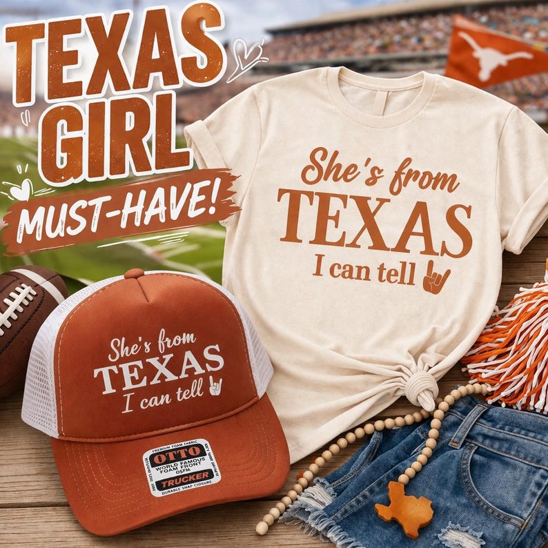 May include: A cream-coloured t-shirt and a trucker hat with the text "She's from TEXAS I can tell" in brown. The hat is orange with a white mesh back. The image also includes a football, denim shorts, and a Texas-shaped charm.