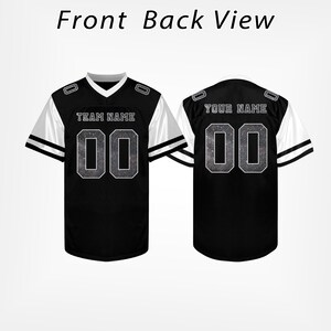 May include: Black and white football jersey with the text "TEAM NAME" and "00" on the front, and "YOUR NAME" and "00" on the back. The jersey has white sleeves with black stripes and a V-neck collar. The text "Front Back View" is at the top.