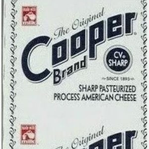 May include: A white package of Cooper Brand Sharp Pasteurized Process American Cheese. The package has a black and white logo with the text "The Original Cooper Brand" and "CV. SHARP" with the words "SINCE 1893" below. The package also has the text "NET WT. 5 LB. (2.27kg)".