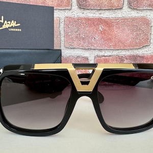 Vintage CAZAL 664 Sunglasses: Black & Gold Frame, Dark Lens Glasses