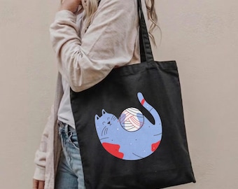 かわいい猫のキャンバストートバッグ、猫好きへのギフト、環境に優しいショッピングバッグ、楽しい猫のデザイン、毛糸玉アート、面白い猫のトートギフト