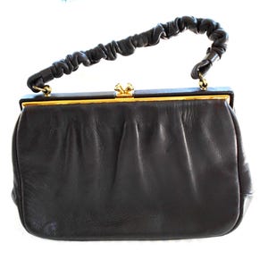 Bolso de mano vintage de cuero marrón con asa superior Etra, años 50