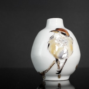 A Porcelain Sake Bottle with Songbird Design by  Takahashi Makoto