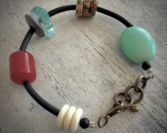 Unique Multi bead mix bracelet with rubber tubing