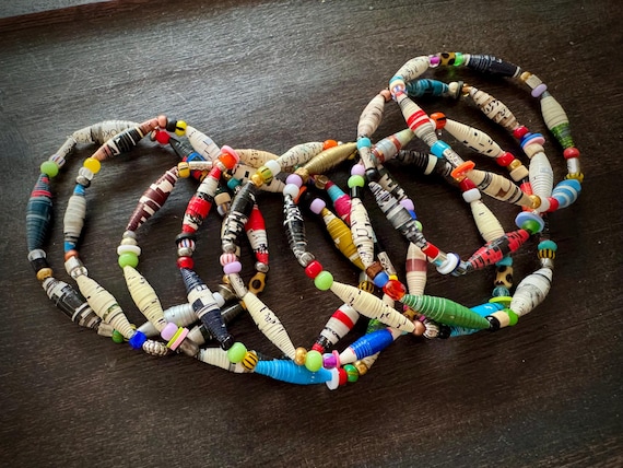 Unique, Colorful, Stacking Stretch Bracelets made with handmade magazine paper beads.