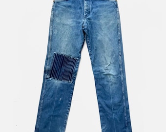 80/90s Distressed & Repaired Wrangler Jeans. Size 32. Made in USA