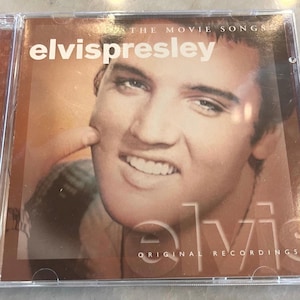 Elvis Presley &quot;The Movie Songs&quot; featuring original recordings.  CD in good condition.  Published in 2003 by Green Hill Production.