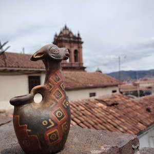 Andean Vicuña Conopa: Inca Ceramic Piece with Geometric Design and Sacred Symbolism