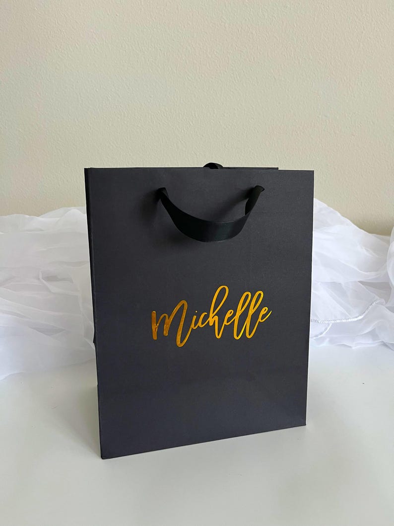 Gifted Bag, custom gift bags, personalized gift bags, luxury gift bags, wedding gift bags, bridesmaid gift bags, personalized bridesmaid gift bags, bachelorette party bag, bridal party gift bag, thank you gift bags, elegant gift bag, custom bag gift, bulk gift bags, bulk custom gift bags, business gift bags, custom gift bag sets, mini custom gift bag, baby shower gift bag, bridal shower gift bag, birthday gift bag, graduation gift bag, anniversary gift bag, small business logo gift bags,