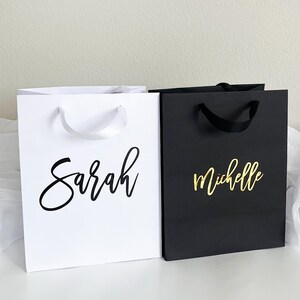 custom gift bags, personalized gift bags, luxury gift bags, wedding gift bags, bridesmaid gift bags, personalized bridesmaid gift bags, bachelorette party bag, bridal party gift bag, thank you gift bags, elegant gift bag, custom bag gift, bulk gift bags, bulk custom gift bags, business gift bags, custom gift bag sets, mini custom gift bag, baby shower gift bag, bridal shower gift bag, birthday gift bag, graduation gift bag, anniversary gift bag, small business logo gift bags,