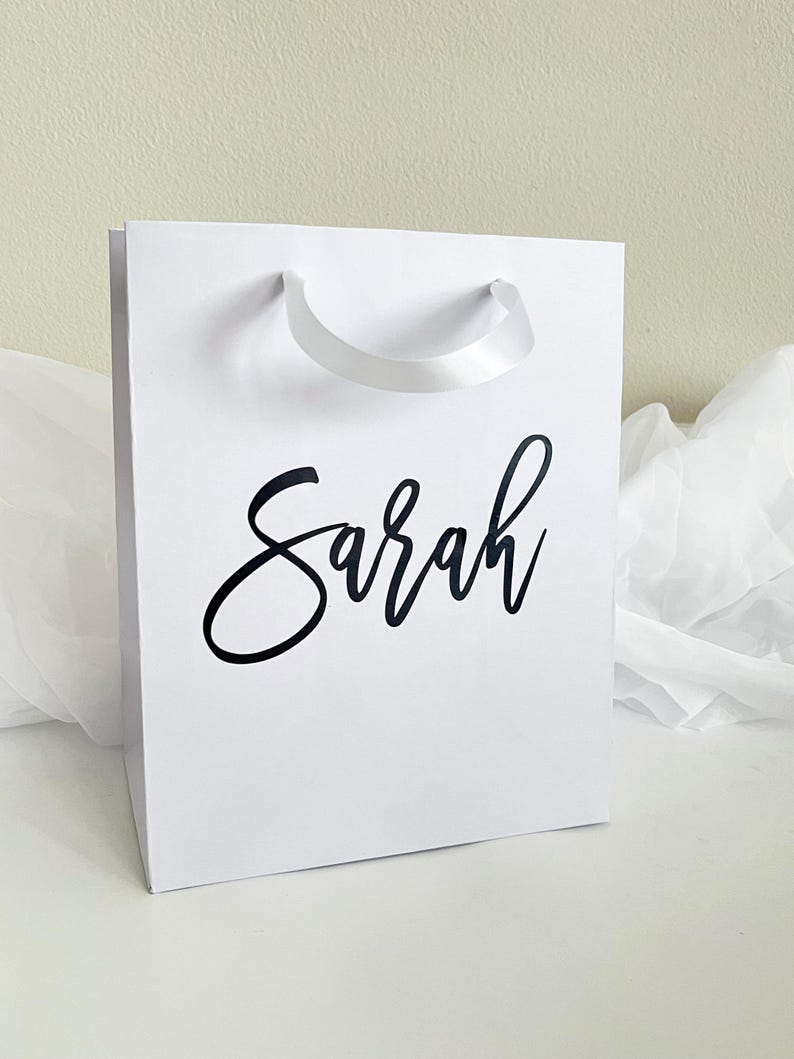custom gift bags, personalized gift bags, luxury gift bags, wedding gift bags, bridesmaid gift bags, personalized bridesmaid gift bags, bachelorette party bag, bridal party gift bag, thank you gift bags, elegant gift bag, custom bag gift, bulk gift bags, bulk custom gift bags, business gift bags, custom gift bag sets, mini custom gift bag, baby shower gift bag, bridal shower gift bag, birthday gift bag, graduation gift bag, anniversary gift bag, small business logo gift bags,
