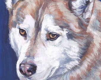 May include: A detailed painting of a dog's face, featuring brown and white fur with a blue background. The dog's eyes are a warm brown, and the artwork is signed "L.A. SHEPARD ART" in the lower right corner. The artwork is a close-up portrait.