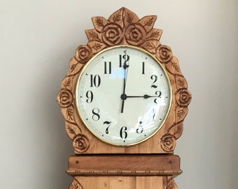 Grandmother clock, grandfather clock, storage clock, rose clock, handmade clock, woodcraft, handmade, artisan, custom made, furniture.