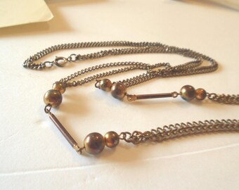 Vintage 1970s Gold-Tone Multi Strand Draping Chain Necklace with Bead & Bar Accents Costume Jewelry